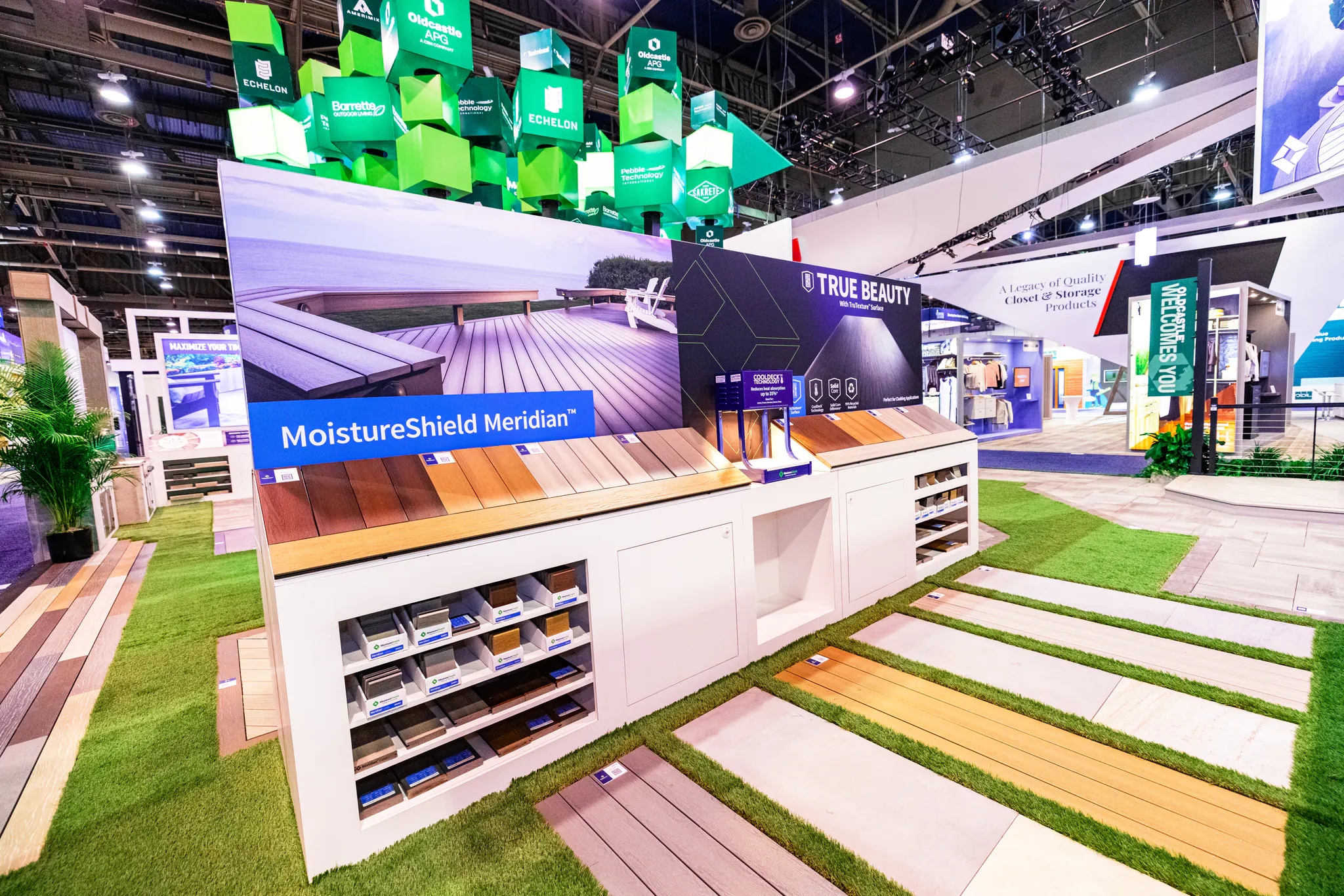 MoistureShield decking display with product samples and outdoor-living graphics.