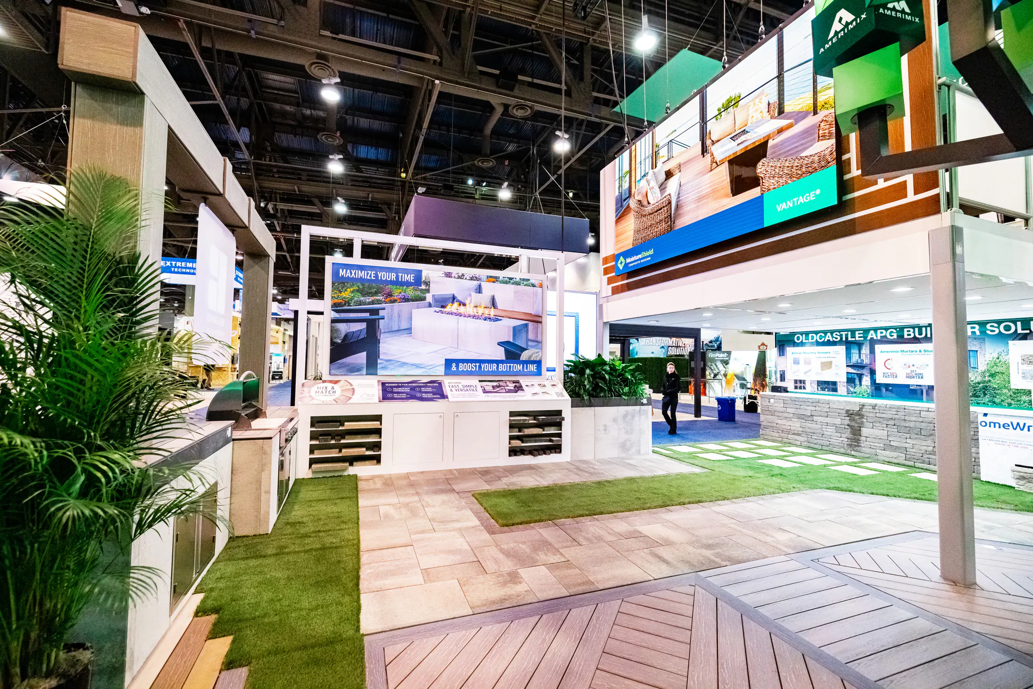 Walk-through view of Oldcastle APG paver, decking and outdoor-living displays.